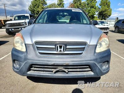 Piąte zdjęcie samochodu w środku: 2006 HONDA CR-V LX VIN:JHLRD68536C018405 - miniatura