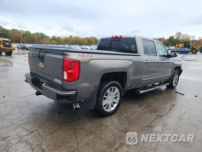 Trzecie zdjęcie samochodu z tyłu: 2017 CHEVROLET SILVERADO K1500 HIGH COUNTRY VIN:3GCUKTEC5HG236294 - miniatura