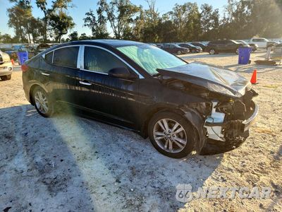 Czwarte zdjęcie samochodu z boku: 2017 HYUNDAI ELANTRA VALUE EDITION VIN:5NPD84LF3HH180428 - miniatura