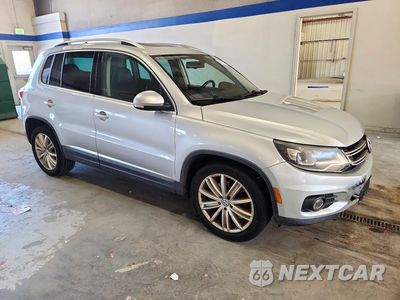 Czwarte zdjęcie samochodu z boku: 2016 VOLKSWAGEN TIGUAN S VIN:WVGAV7AX4GW574873 - miniatura