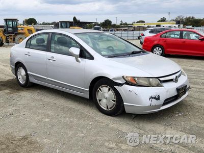 Czwarte zdjęcie samochodu z boku: 2006 HONDA CIVIC HYBRID VIN:JHMFA362X6S008488 - miniatura