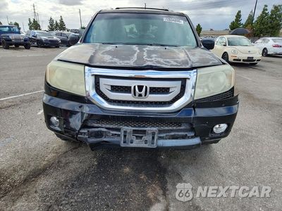 Piąte zdjęcie samochodu w środku: 2011 HONDA PILOT TOURING VIN:5FNYF3H93BB047405 - miniatura
