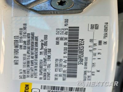 Zdjęcie 13 z 13 samochodu: 2014 FORD FUSION TITANIUM PHEV VIN:3FA6P0SU8ER378554 - miniatura