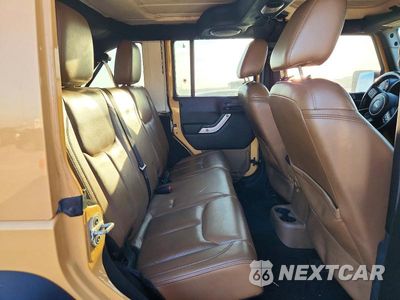 Zdjęcie 11 z 13 samochodu: 2014 JEEP WRANGLER UNLIMITED SAHARA VIN:1C4BJWEG5EL110854 - miniatura