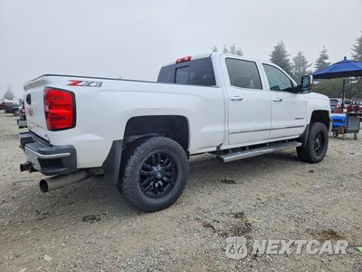Trzecie zdjęcie samochodu z tyłu: 2019 CHEVROLET SILVERADO K2500 HEAVY DUTY LTZ VIN:1GC1KTEY8KF121325 - miniatura