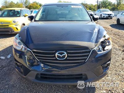 Piąte zdjęcie samochodu w środku: 2016 MAZDA CX-5 TOURING VIN:JM3KE4CYXG0617071 - miniatura