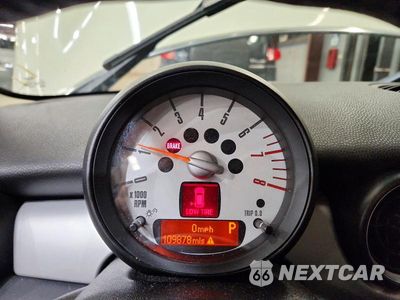 Zdjęcie 9 z 12 samochodu: 2011 MINI COOPER VIN:WMWSU3C5XBT091752 - miniatura