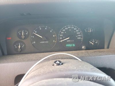 Zdjęcie 9 z 13 samochodu: 1999 JEEP GRAND CHEROKEE LAREDO VIN:1J4GW58S3XC609781 - miniatura