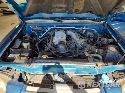 Zdjęcie 11 z 12 samochodu: 2002 NISSAN FRONTIER SVE-V6 VIN:1N6MD29Y92C312360 - miniatura