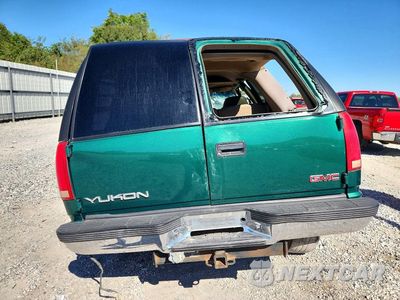 Zdjęcie 6 z 14 samochodu: 1999 GMC YUKON VIN:1GKEK13R4XJ736075 - miniatura