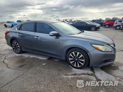 Czwarte zdjęcie samochodu z boku: 2018 NISSAN ALTIMA VIN:1N4AL3AP7JC211467 - miniatura
