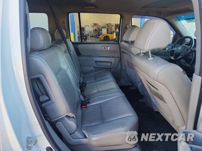 Zdjęcie 11 z 13 samochodu: 2011 HONDA PILOT EXL VIN:5FNYF3H54BB010070 - miniatura