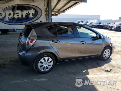 Trzecie zdjęcie samochodu z tyłu: 2014 TOYOTA PRIUS C TWO VIN:JTDKDTB36E1570575 - miniatura