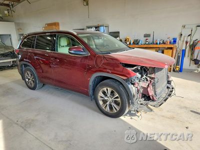 Czwarte zdjęcie samochodu z boku: 2014 TOYOTA HIGHLANDER XLE VIN:5TDJKRFH1ES054718 - miniatura