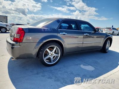 Trzecie zdjęcie samochodu z tyłu: 2010 CHRYSLER 300 TOURING VIN:2C3CA4CD6AH211298 - miniatura