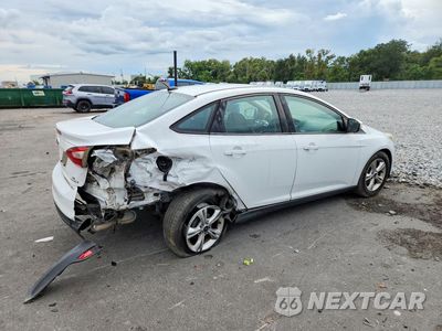 Trzecie zdjęcie samochodu z tyłu: 2013 FORD FOCUS SE VIN:1FADP3F20DL157092 - miniatura