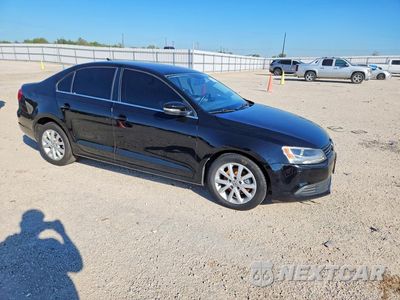 Czwarte zdjęcie samochodu z boku: 2014 VOLKSWAGEN JETTA SE VIN:3VWD07AJ2EM371163 - miniatura