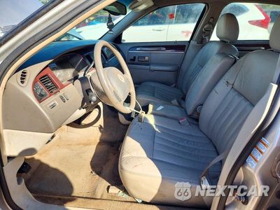 Zdjęcie 7 z 12 samochodu: 2004 LINCOLN TOWN CAR EXECUTIVE VIN:1LNHM81W14Y644733 - miniatura