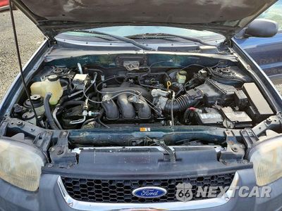 Zdjęcie 12 z 13 samochodu: 2001 FORD ESCAPE XLT VIN:1FMCU04131KE70657 - miniatura