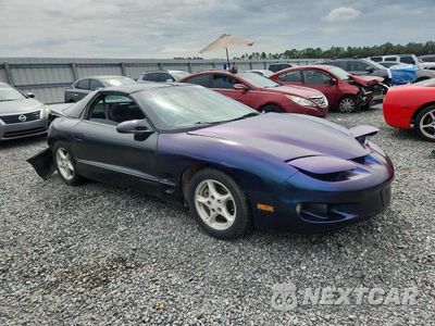 Czwarte zdjęcie samochodu z boku: 2000 PONTIAC FIREBIRD VIN:2G2FS22K9Y2110381 - miniatura