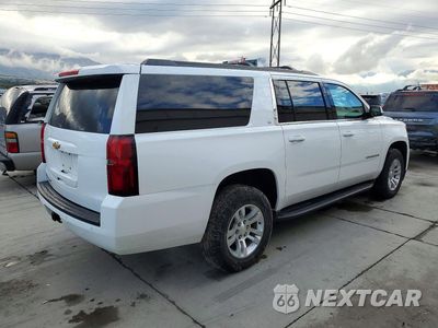 Trzecie zdjęcie samochodu z tyłu: 2019 CHEVROLET SUBURBAN K1500 LT VIN:1GNSKHKC0KR193393 - miniatura