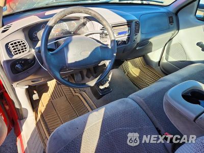 Zdjęcie 8 z 12 samochodu: 2001 FORD F-150 VIN:1FTZF18261NA39911 - miniatura