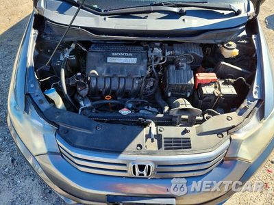 Zdjęcie 11 z 12 samochodu: 2011 HONDA INSIGHT EX VIN:JHMZE2H76BS012889 - miniatura