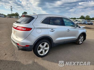 Trzecie zdjęcie samochodu z tyłu: 2018 LINCOLN MKC PREMIERE VIN:5LMCJ1D92JUL03423 - miniatura