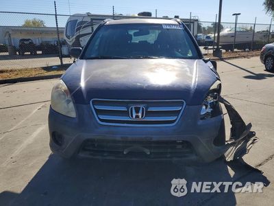 Piąte zdjęcie samochodu w środku: 2006 HONDA CR-V LX VIN:JHLRD78566C031669 - miniatura