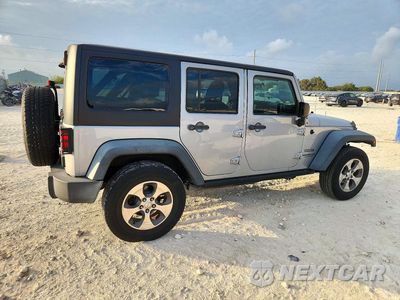 Trzecie zdjęcie samochodu z tyłu: 2016 JEEP WRANGLER UNLIMITED SPORT VIN:1C4BJWDG8GL125045 - miniatura