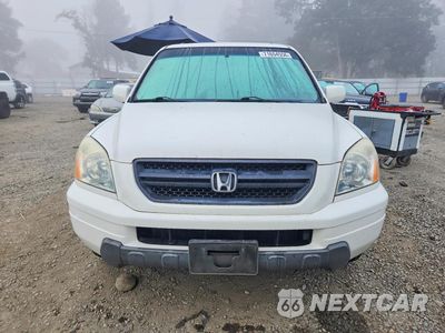 Piąte zdjęcie samochodu w środku: 2004 HONDA PILOT EX VIN:2HKYF18404H608673 - miniatura