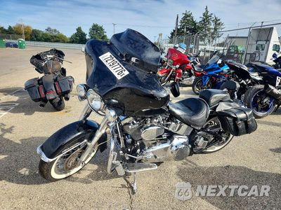 Trzecie zdjęcie samochodu z tyłu: 2010 HARLEY-DAVIDSON FLSTN VIN:1HD1JD517AB033091 - miniatura