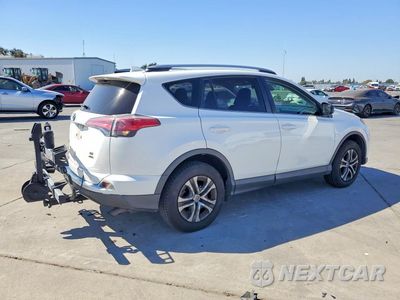 Trzecie zdjęcie samochodu z tyłu: 2018 TOYOTA RAV4 LE VIN:JTMBFREVXJJ735127 - miniatura