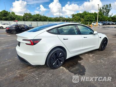 Trzecie zdjęcie samochodu z tyłu: 2025 TESLA MODEL 3 VIN:5YJ3E1EA6SF008419 - miniatura