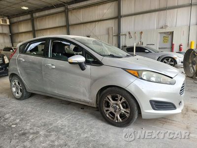 Czwarte zdjęcie samochodu z boku: 2014 FORD FIESTA SE VIN:3FADP4EJXEM166090 - miniatura