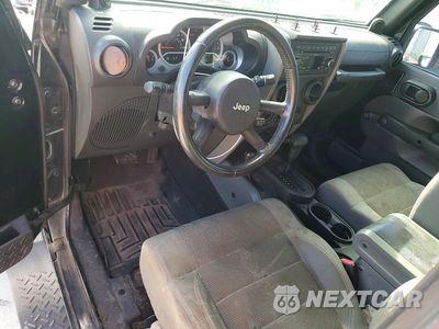 Zdjęcie 8 z 12 samochodu: 2007 JEEP WRANGLER SAHARA VIN:1J4FA54107L179506 - miniatura