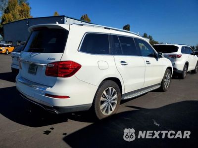 Trzecie zdjęcie samochodu z tyłu: 2013 MERCEDES-BENZ GL 450 4MATIC VIN:4JGDF7CE8DA181358 - miniatura
