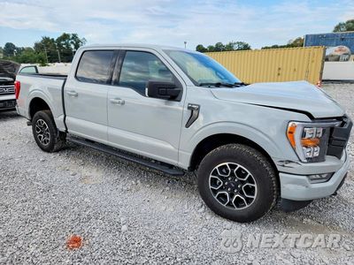 Czwarte zdjęcie samochodu z boku: 2023 FORD F150 SUPERCREW VIN:1FTEW1EP4PFA84010 - miniatura