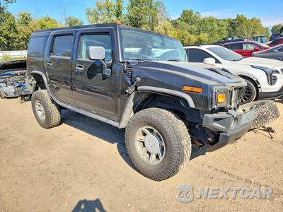 Czwarte zdjęcie samochodu z boku: 2004 HUMMER H2 VIN:5GRGN23U04H114421 - miniatura