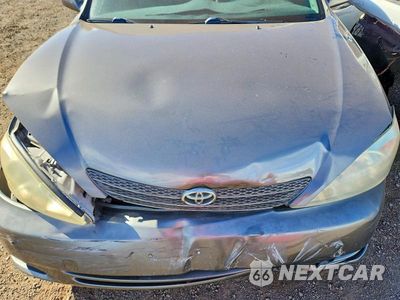 Zdjęcie 11 z 12 samochodu: 2004 TOYOTA CAMRY STANDARD VIN:JTDBE32K840280959 - miniatura