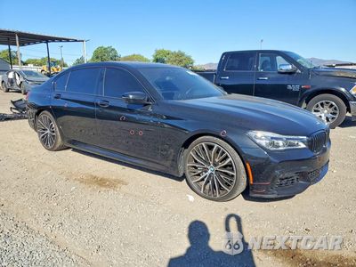 Czwarte zdjęcie samochodu z boku: 2019 BMW 750 I VIN:WBA7F0C50KGM24886 - miniatura