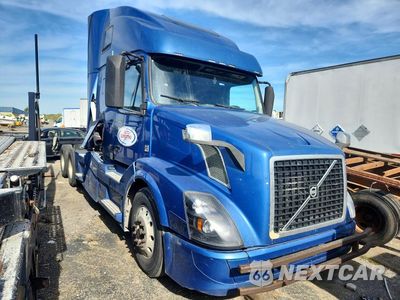 Czwarte zdjęcie samochodu z boku: 2018 VOLVO VNL SEMI TRUCK VIN:4V4NC9EH1JN886273 - miniatura