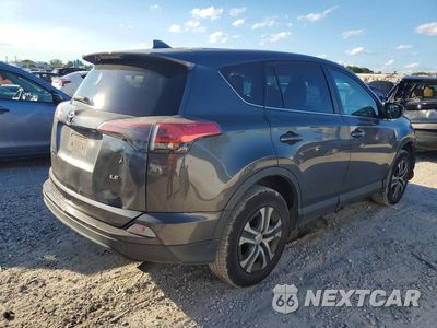 Trzecie zdjęcie samochodu z tyłu: 2018 TOYOTA RAV4 LE VIN:2T3ZFREV7JW411570 - miniatura
