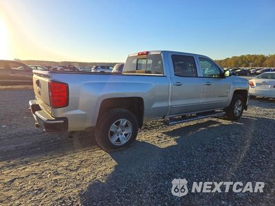 Trzecie zdjęcie samochodu z tyłu: 2017 CHEVROLET SILVERADO K1500 LT VIN:3GCUKREC7HG381047 - miniatura