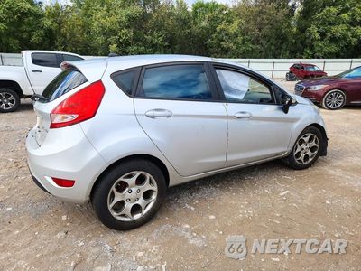 Trzecie zdjęcie samochodu z tyłu: 2011 FORD FIESTA SES VIN:3FADP4FJ2BM210058 - miniatura