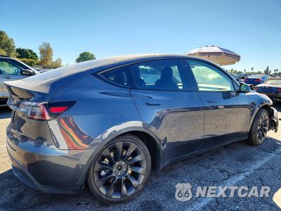 Trzecie zdjęcie samochodu z tyłu: 2022 TESLA MODEL Y VIN:7SAYGDEE9NF355870 - miniatura