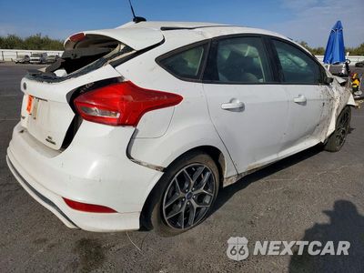 Trzecie zdjęcie samochodu z tyłu: 2016 FORD FOCUS SE VIN:1FADP3K27GL315633 - miniatura