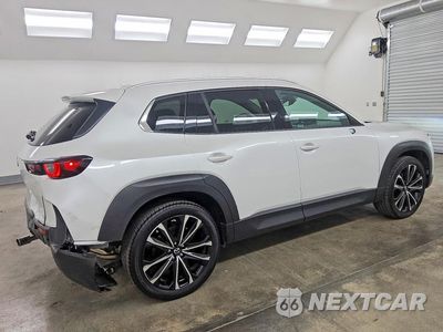 Trzecie zdjęcie samochodu z tyłu: 2026 MAZDA CX-50 PREMIUM VIN:7MMVABDL6TN467319 - miniatura