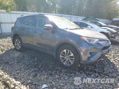Czwarte zdjęcie samochodu z boku: 2017 TOYOTA RAV4 HYBRID XLE VIN:JTMRJREV1HD127003 - miniatura