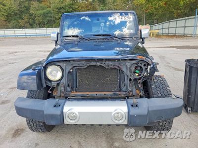 Piąte zdjęcie samochodu w środku: 2011 JEEP WRANGLER UNLIMITED SAHARA VIN:1J4BA5H16BL526581 - miniatura